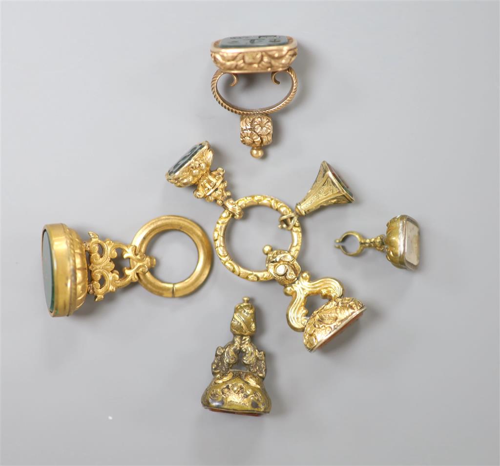 7 assorted fob seals.